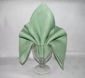 Green lily goblet folded napkin